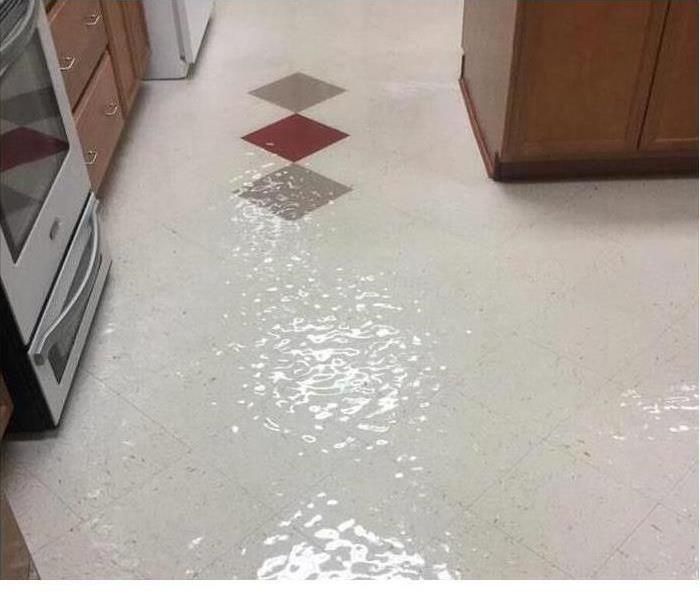 Wet kitchen flooring from flood