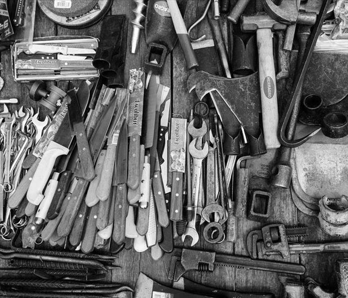 An assortment of tools piled up. 